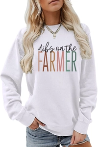 Detail shot of white crewneck sweatshirt featuring dibs on the farmer graphic print