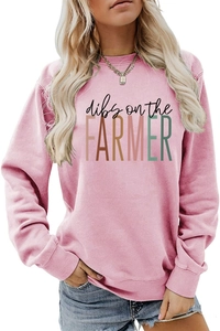 Detail of dibs on the farmer letter print on pink crewneck sweatshirt for women