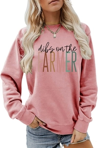 Detail of dibs on the farmer letter print on a rose pink crewneck long sleeve sweatshirt