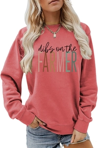 Detail of red crewneck sweatshirt featuring dibs on the farmer graphic print design