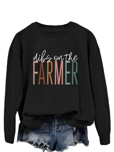 Detail of dibs on the farmer letter print on black crewneck long sleeve sweatshirt