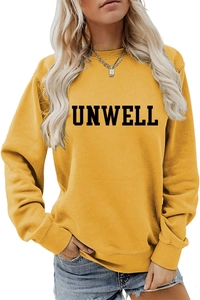 Detail of Mustard Yellow sweatshirt with UNWELL letter print and ribbed cuffs