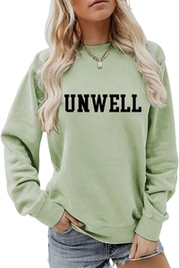 Detail of green crewneck sweatshirt with black UNWELL print and knitted cotton fabric