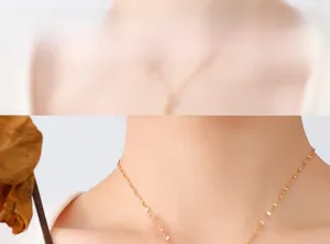 Close-up of elegant 18K gold plated crescent moon necklace chain worn on a model neck