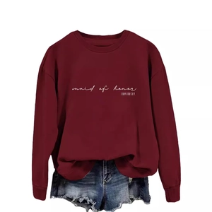Women's burgundy maid of honor crewneck sweatshirt paired with distressed denim shorts