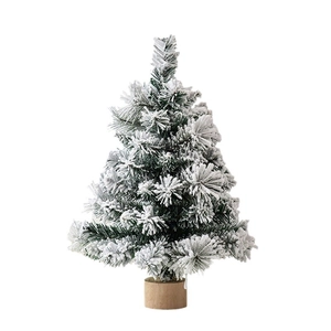 Mini artificial snowy Christmas tree with white flocking and round solid wooden base