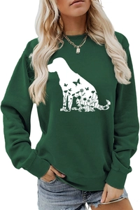 Détail de l'imprimé silhouette de chien avec motifs floraux sur sweat vert foncé
