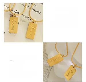 Detail of 18K gold plated titanium steel snake chain with engraved Love square pendant
