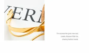 Close-up of 18K gold plated stainless steel crossover bangle with mirror finish