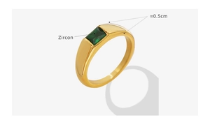 Detail of 0.5cm gold band ring featuring a rectangular emerald green zircon setting
