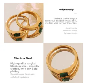 Macro view of 18K gold plated titanium ring with square emerald green zircon stone