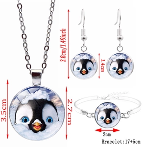 Parure bijoux pingouin minimaliste avec collier argenté, bracelet et boucles d'oreilles