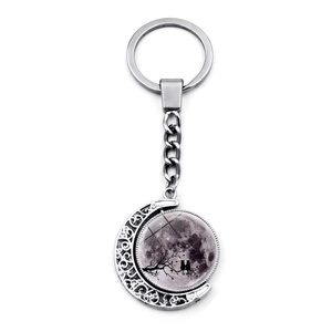Silver alloy moon keychain with rotating double-sided black cats on branch pendant