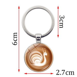 Detailed dimensions of silver cappuccino latte art keychain with a snail foam pendant