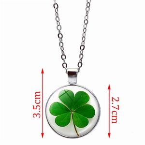Crystal glass four-leaf clover pendant necklace with 2.7cm diameter on white background