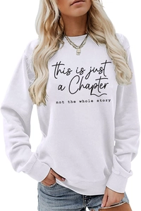 Close-up of inspirational typography on white long sleeve loose fit pullover sweatshirt