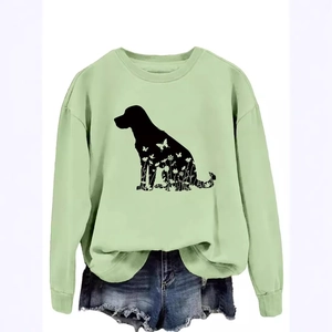 Sweat vert clair à col rond avec silhouette de chien fleurie et poignets côtelés