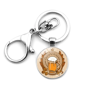 Detail of keychain with lobster clasp and beer theme glass pendant with Always On Tap text