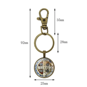 Vintage bronze Saint Benedict Medal keychain with lobster clasp and round pendant