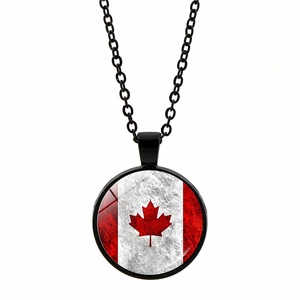 Vintage Canada flag necklace with red maple leaf glass dome pendant on black chain