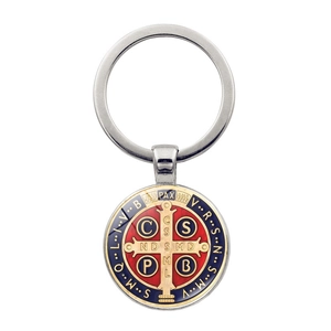 Detail of Saint Benedict medal keychain with red and blue enamel in gold finish frame