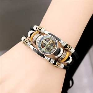 Luminous Saint Benedict multilayer leather bracelet with glowing beads and vintage charms