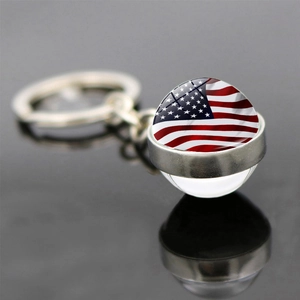 Llavero vintage bandera USA con bola de cristal de doble cara y anillo de metal plata