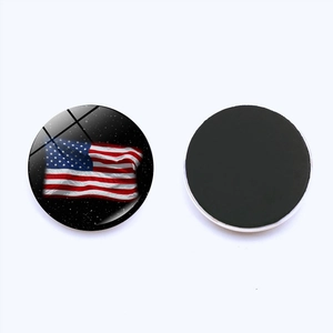 Detailed front and back view of a 25mm American flag glass refrigerator magnet with magnetic base