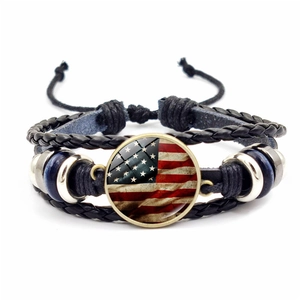 Handmade multilayer leather bracelet featuring a vintage USA flag glass cabochon pendant