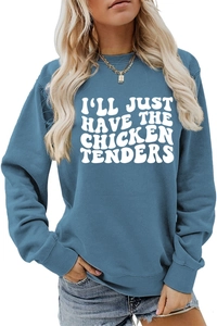 Detail showing the white 'I'LL JUST HAVE THE CHICKEN TENDERS' print on a dusty blue sweatshirt