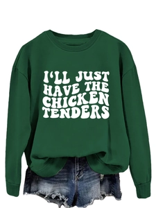 Close-up of I'LL JUST HAVE THE CHICKEN TENDERS print on dark green crewneck sweatshirt