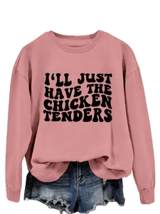 Detail of a pink crewneck sweatshirt with 'I'LL JUST HAVE THE CHICKEN TENDERS' black text