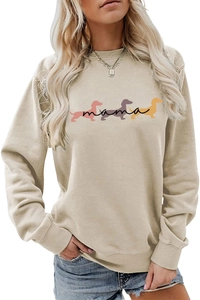 Dettaglio della felpa beige mama con stampe di bassotti colorati e scollo rotondo