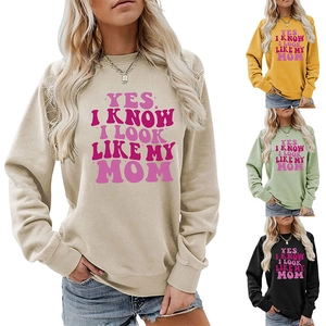 Detail of ribbed cuffs and text print on multi-colored crewneck sweatshirts