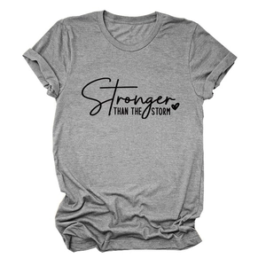 Detail of Stronger Than The Storm print on a heather grey crew neck short sleeve t-shirt