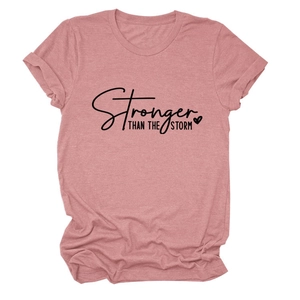 Detailed view of mauve t-shirt showing Stronger Than The Storm print and rolled sleeves