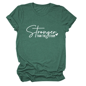 Detail of Stronger Than The Storm slogan print on heather green cotton t-shirt