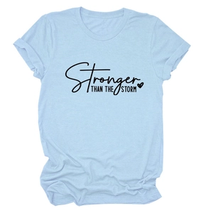 Light blue crewneck t-shirt with Stronger Than The Storm slogan print and heart icon