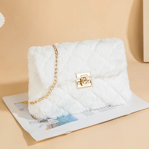 Chic white faux fur crossbody bag with quilted pattern and gold chain strap for women