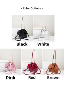 Detail showing various colors of drawstring bucket bag with gold chain and coin purse