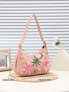 Dettaglio delle dimensioni 24x16x6cm della borsa rosa con ricamo floreale 3D
