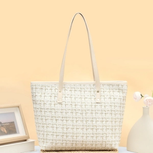 Sac seau en tweed crème chic avec texture tissée et longues lanières en cuir pour femme