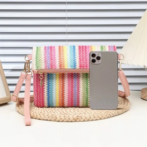 Chic multi-color striped woven crossbody bag with pink leather strap for women