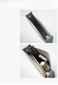 Vue intérieure montrant la grande capacité pour téléphone et lunettes du sac gris