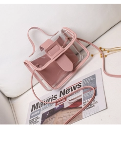 Detailed view of pink transparent PVC mini shoulder bag with internal leather pouch