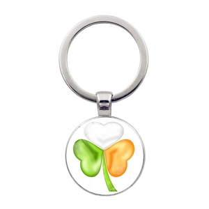 Close-up of Ireland flag shamrock keychain with heart-shaped leaves and silver ring