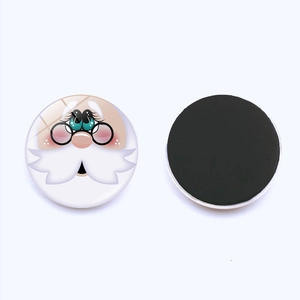 Detail view showing front and back of a Santa Claus snowman magnetic fridge magnet