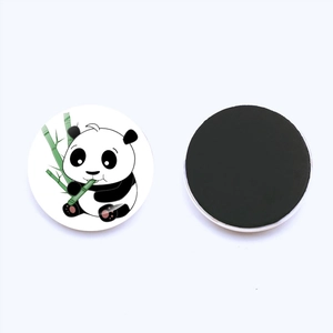 Round crystal glass panda fridge magnet with cute panda eating bamboo on white background