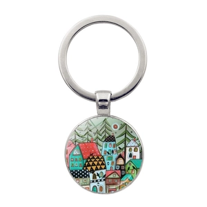 Detailed view of abstract landscape art keychain with a miniature house under the stars