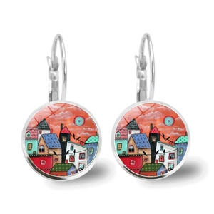 Detailed view of silver hook earrings with abstract colorful house painting pendant